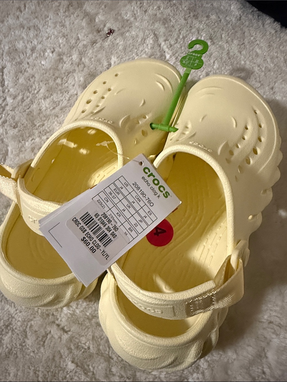 CROCS Kids' Classic Clog Sandals in Pale Yellow